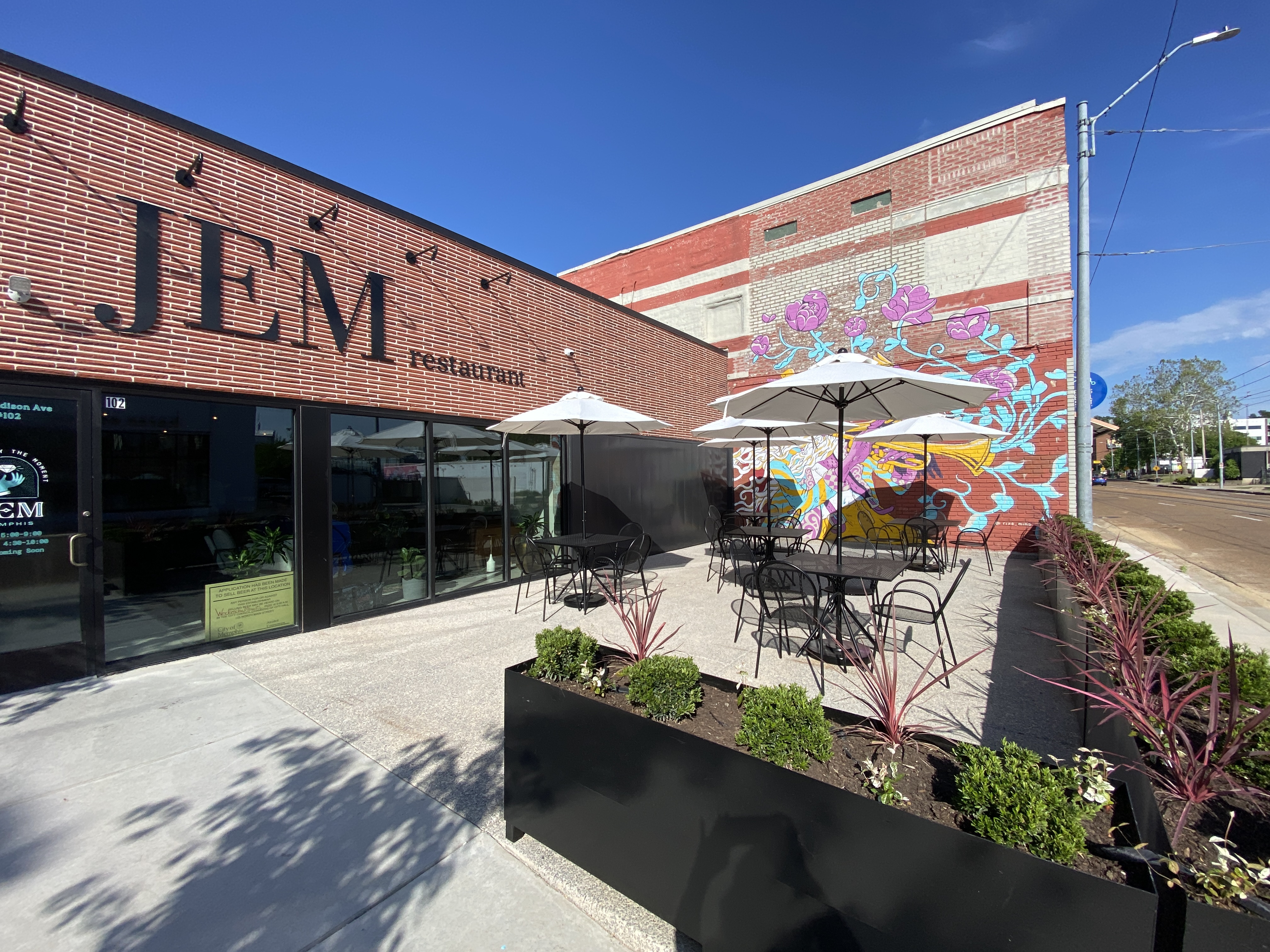 exterior of JEM Dining with patio