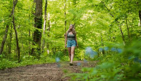 A woman hiking the trails at Meeman Shelby Forest State Park.