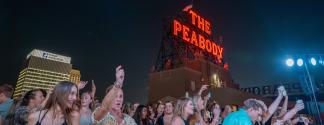 people dancing during Peabody rooftop party