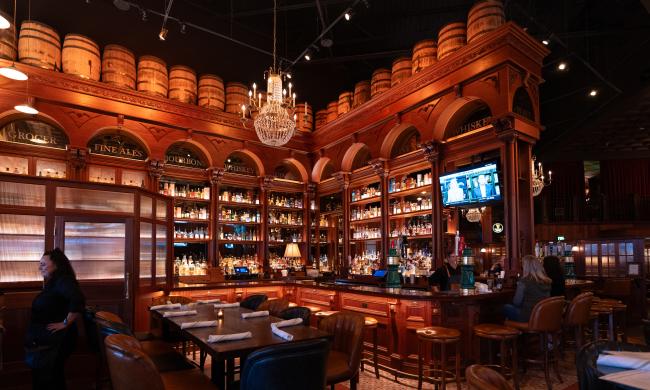 Bog &amp; Barley bar and dining space with an imported wood-heavy design from Ireland.