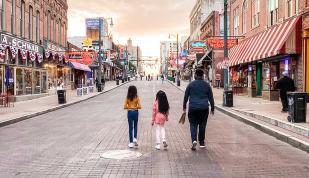 Family strolling Beale Street