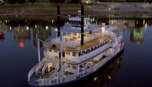 A Memphis Queen riverboat floats on the Mississippi River.
